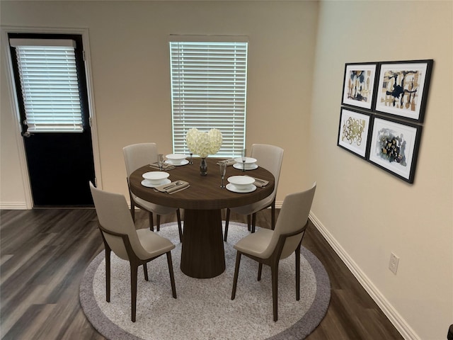 dining room featuring dark hardwood / wood-style floors