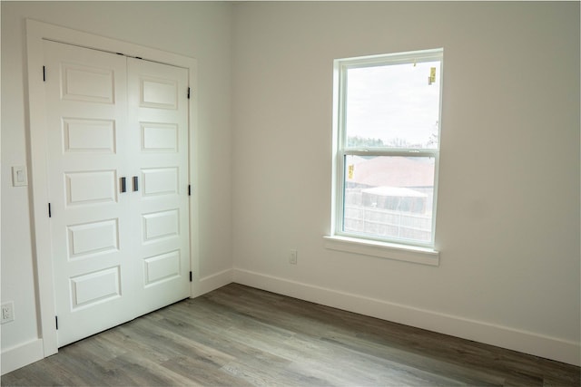 spare room featuring light hardwood / wood-style flooring