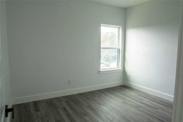 spare room featuring hardwood / wood-style floors