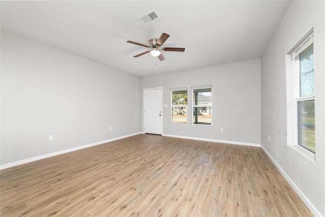 unfurnished room featuring light hardwood / wood-style floors and ceiling fan