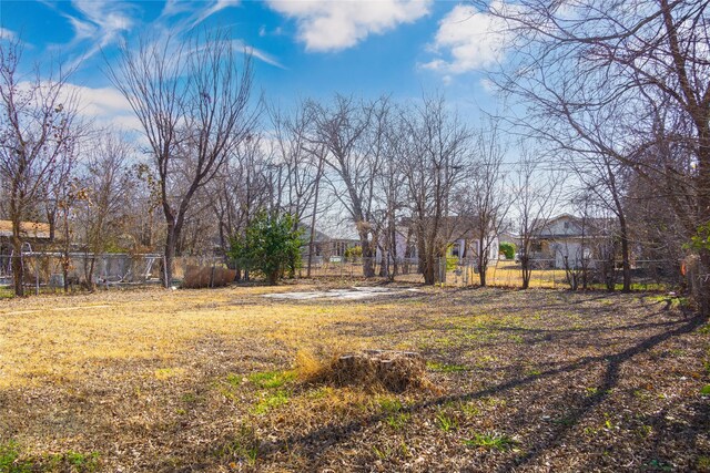 rear view of house with a lawn