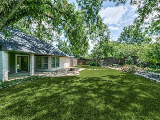 view of yard with a patio area