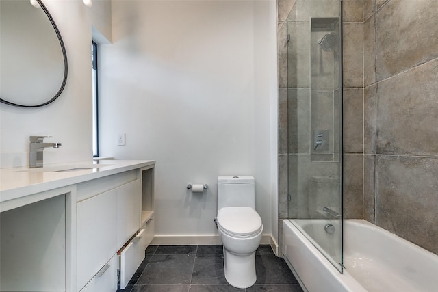 full bathroom with vanity, tile patterned floors, shower / bath combination with glass door, and toilet