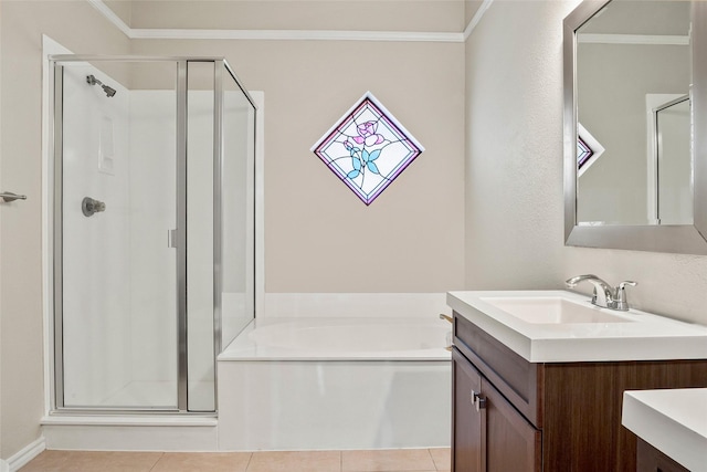 bathroom featuring vanity, ornamental molding, tile patterned floors, and independent shower and bath