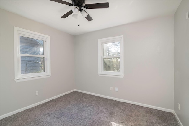 carpeted empty room with ceiling fan