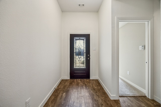 doorway with dark hardwood / wood-style floors