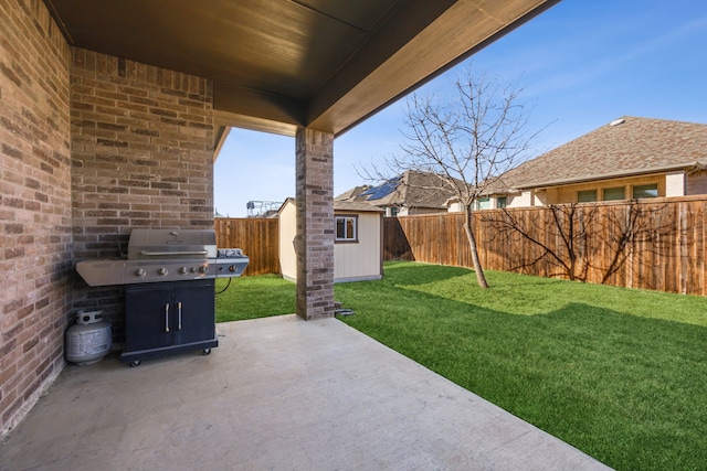 view of patio / terrace featuring a storage shed