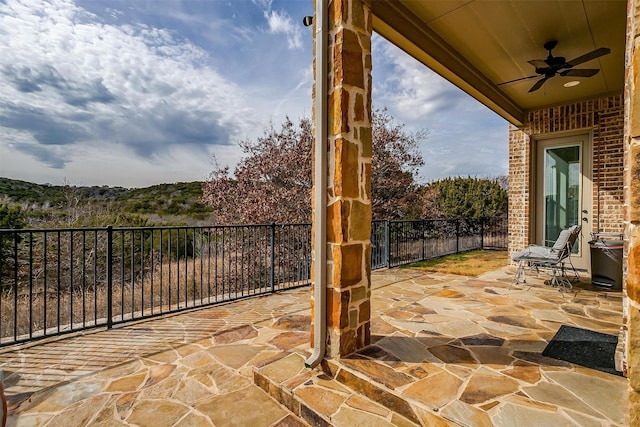 view of patio / terrace featuring ceiling fan