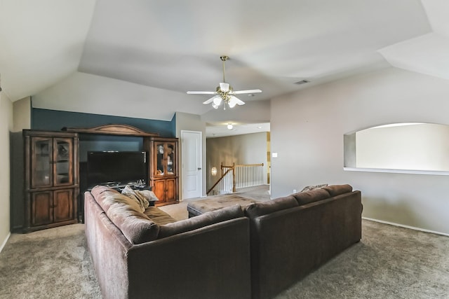 living room with lofted ceiling, carpet flooring, and ceiling fan