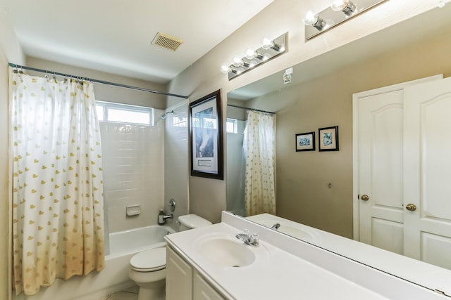 full bathroom with vanity, toilet, and shower / bath combo with shower curtain