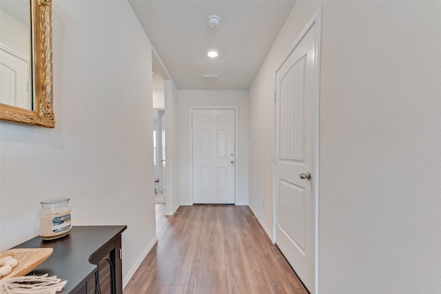 hallway featuring light hardwood / wood-style floors