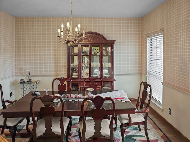 dining space featuring an inviting chandelier and a wealth of natural light