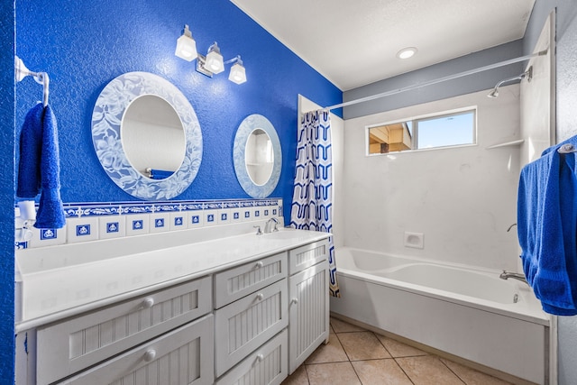 bathroom featuring shower / bath combo, tile patterned floors, and vanity