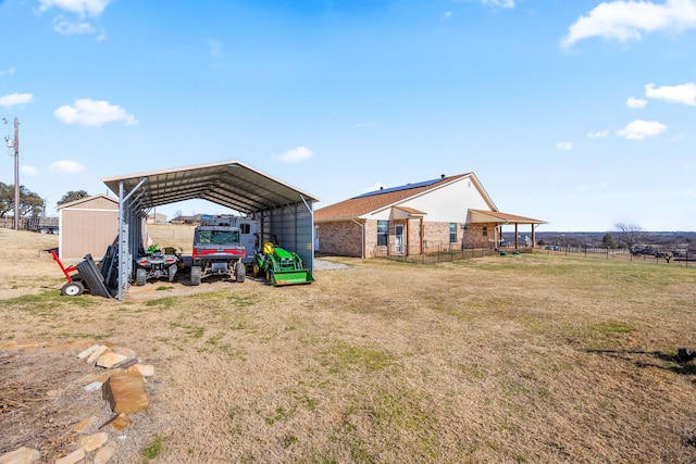 view of yard with a carport