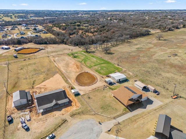 birds eye view of property featuring a rural view