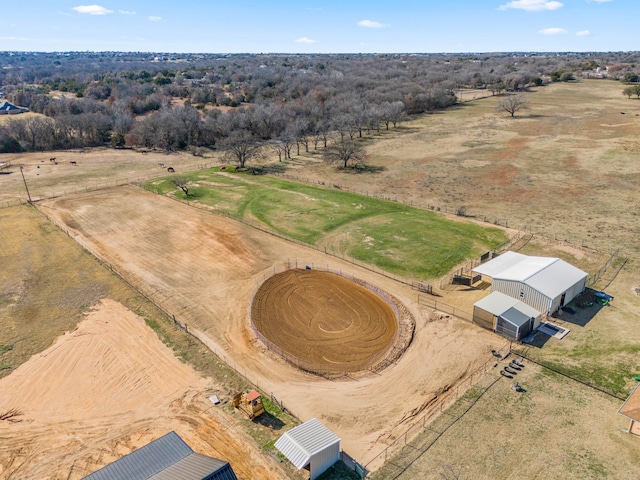 birds eye view of property with a rural view