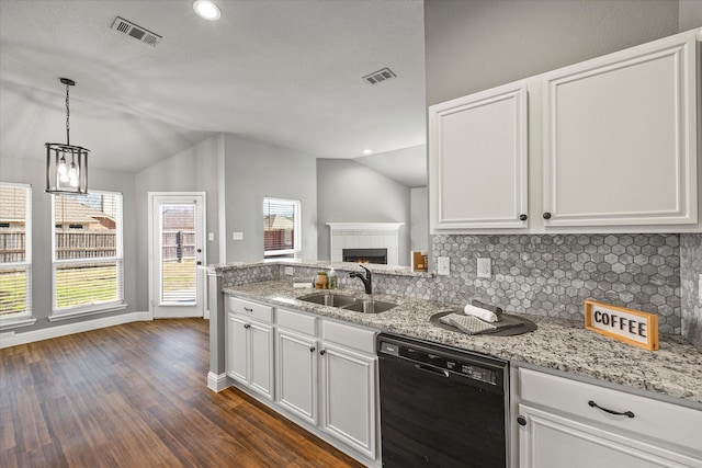 kitchen featuring lofted ceiling, sink, white cabinetry, dark hardwood / wood-style flooring, and dishwasher