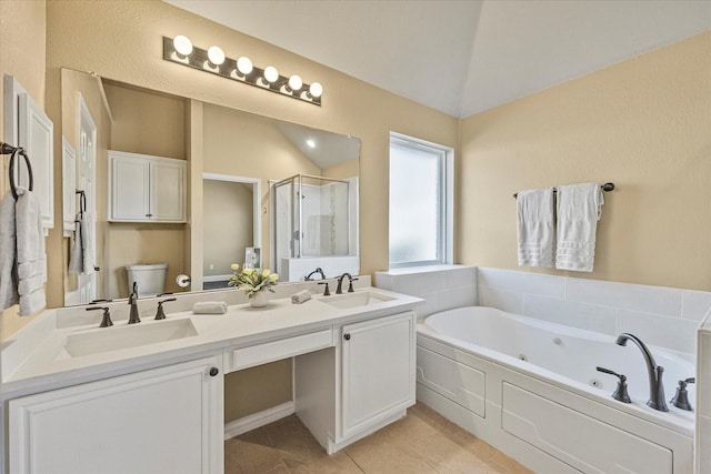 full bathroom with lofted ceiling, vanity, separate shower and tub, toilet, and tile patterned floors