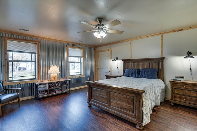 bedroom with dark wood-type flooring and ceiling fan