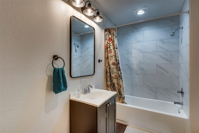 bathroom with vanity and shower / bathtub combination with curtain