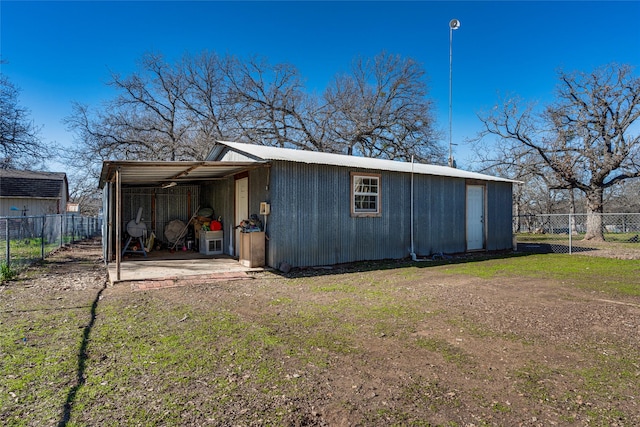 view of outdoor structure with a lawn