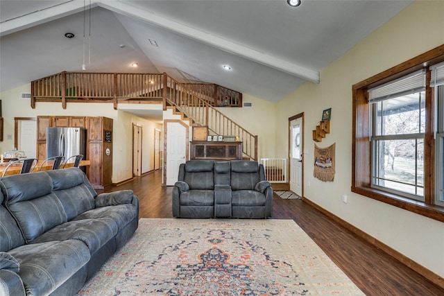 living room featuring beamed ceiling, dark hardwood / wood-style floors, and high vaulted ceiling