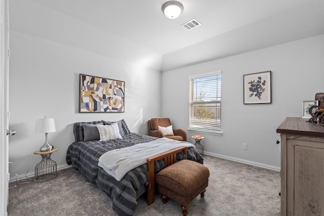 carpeted bedroom featuring lofted ceiling