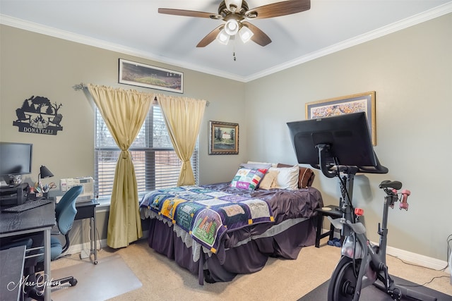 carpeted bedroom featuring ornamental molding and ceiling fan