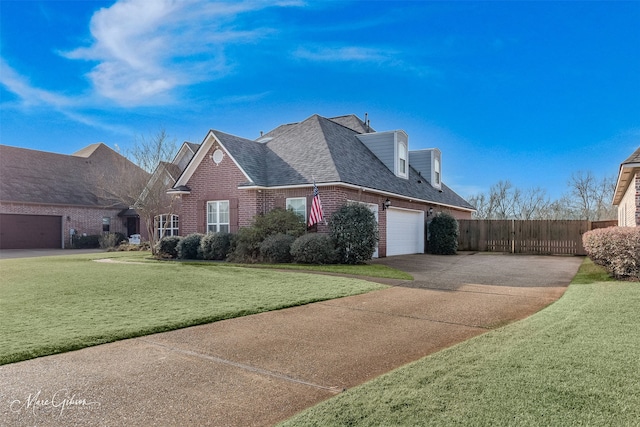 view of home's exterior with a garage and a lawn