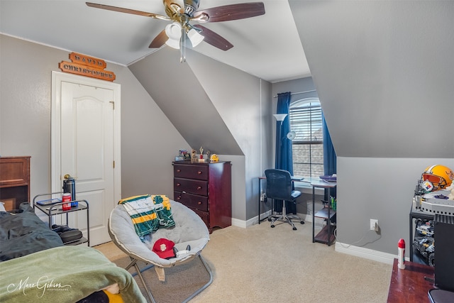 bedroom featuring lofted ceiling, carpet floors, and ceiling fan