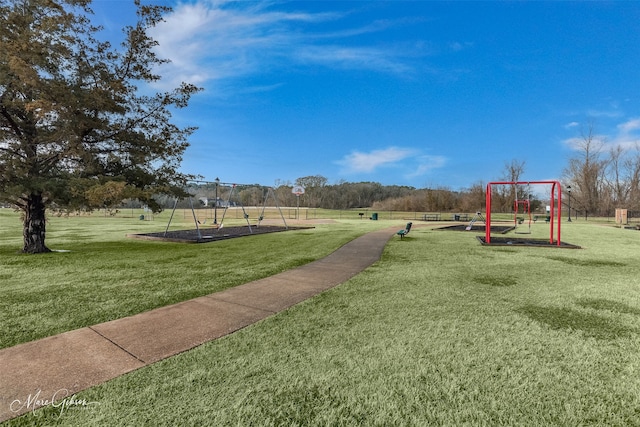 view of playground with a yard