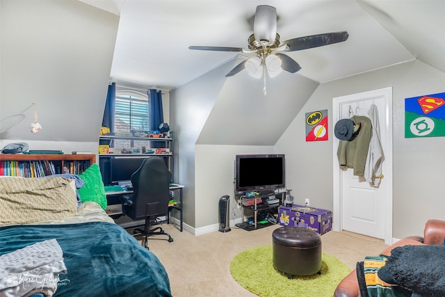 carpeted bedroom featuring ceiling fan and vaulted ceiling