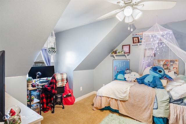 bedroom featuring vaulted ceiling, ceiling fan, and carpet