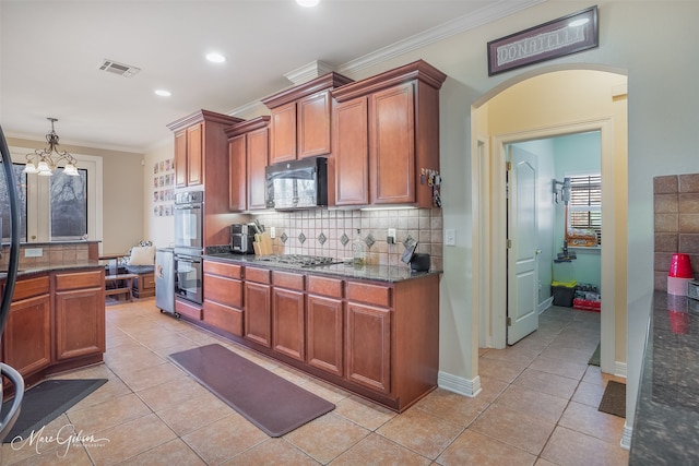 kitchen featuring ornamental molding, light tile patterned floors, decorative backsplash, and black appliances