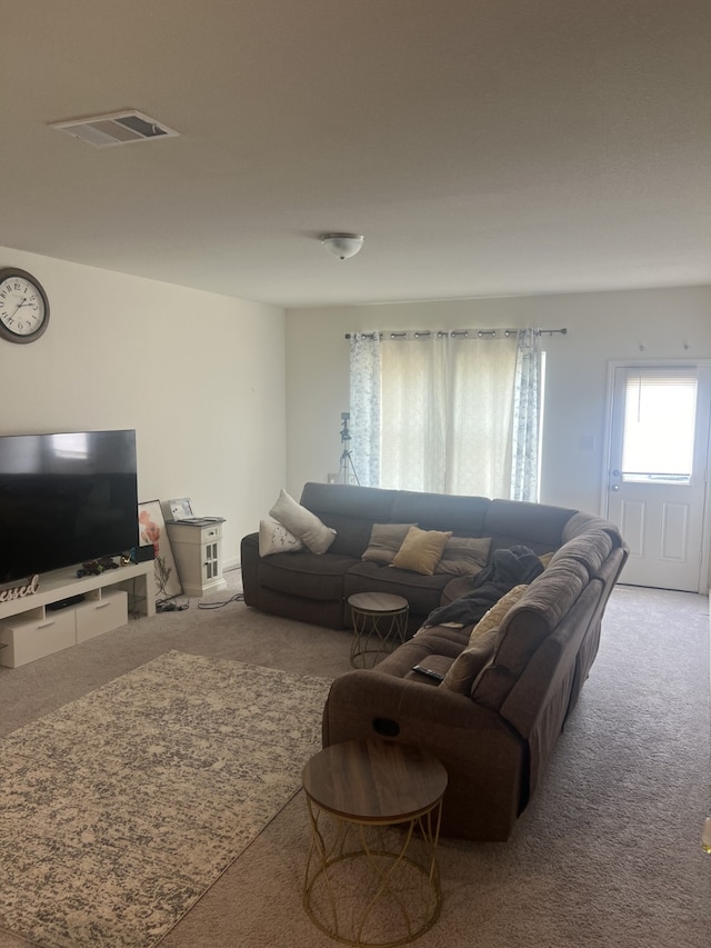 living room with light colored carpet