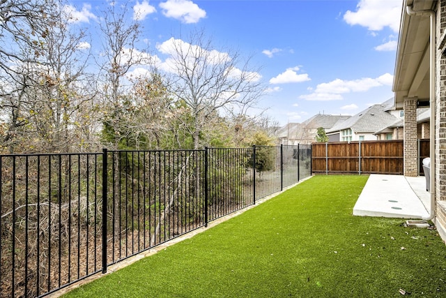 view of yard with a patio area