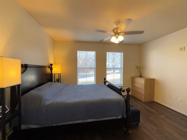 bedroom featuring dark wood-type flooring and ceiling fan