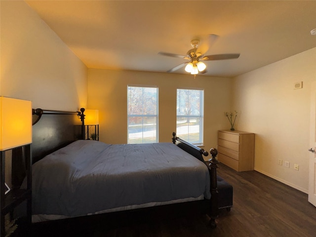 bedroom featuring dark wood-type flooring and ceiling fan