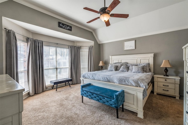 bedroom featuring light carpet, crown molding, and lofted ceiling