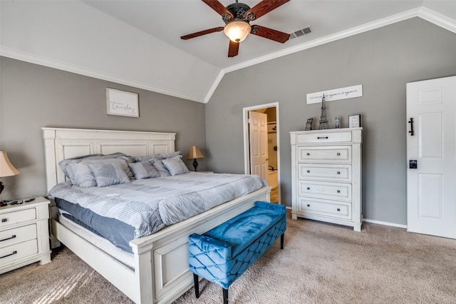 bedroom featuring light carpet, visible vents, baseboards, ornamental molding, and vaulted ceiling