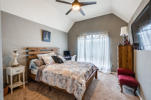 carpeted bedroom with vaulted ceiling, baseboards, and ceiling fan