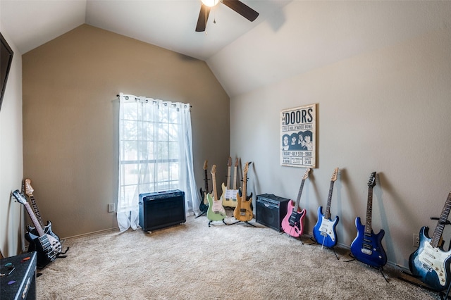 recreation room with vaulted ceiling, carpet floors, and a ceiling fan