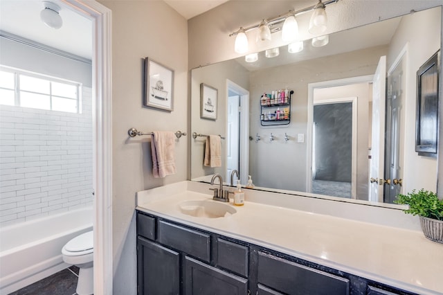 full bathroom with shower / tub combination, vanity, and toilet