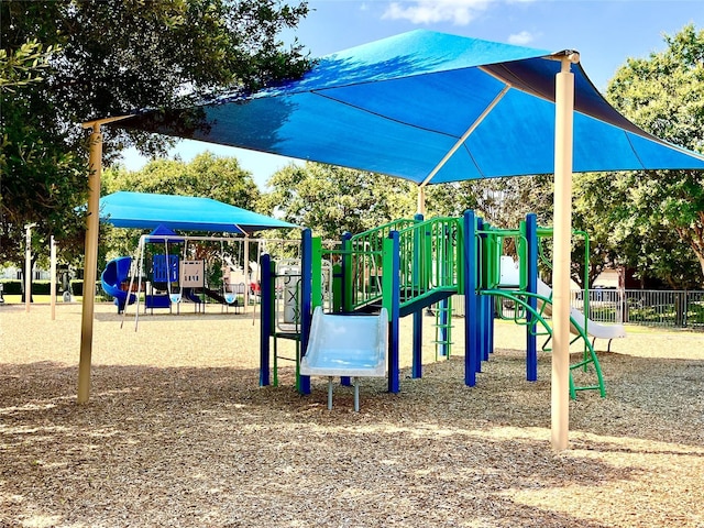 community playground featuring fence