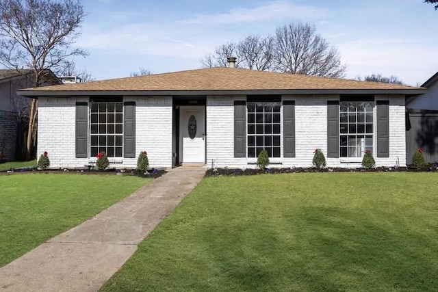 3521 Post Oak Rd, Garland, TX 75044 - ranch-style home with brick siding, a front lawn, and a shingled roof