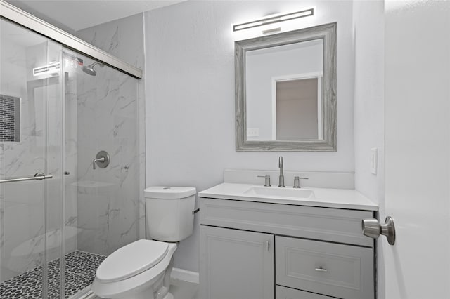 3521 Post Oak Rd, Garland, TX 75044 - bathroom with toilet, vanity, and a marble finish shower