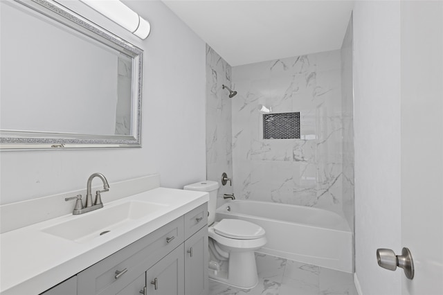 3521 Post Oak Rd, Garland, TX 75044 - full bathroom with marble look tile flooring, vanity, toilet, and shower / tub combination