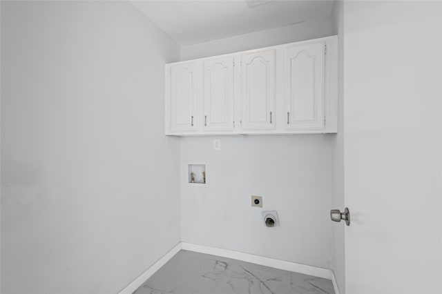 laundry area with electric dryer hookup, washer hookup, and cabinets