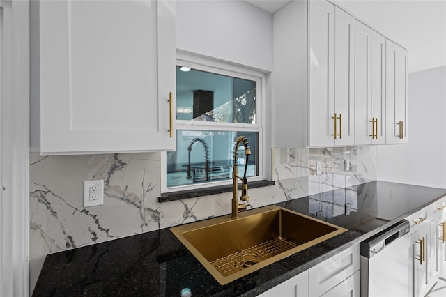 3521 Post Oak Rd, Garland, TX 75044 - kitchen featuring dishwasher, tasteful backsplash, a sink, white cabinets, and dark stone counters