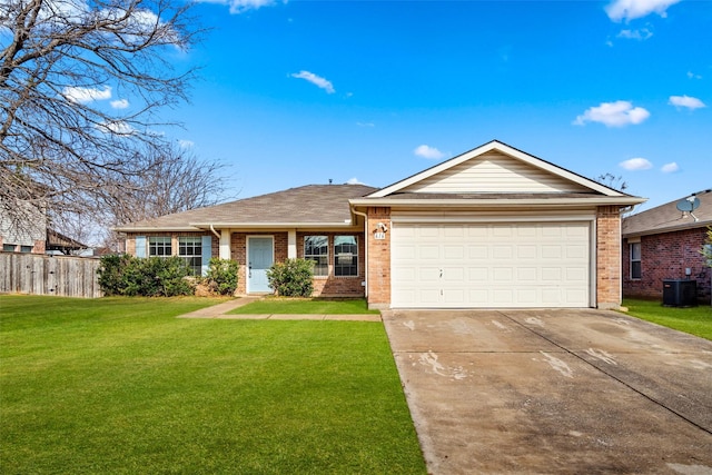 ranch-style home with a garage, central AC, and a front yard